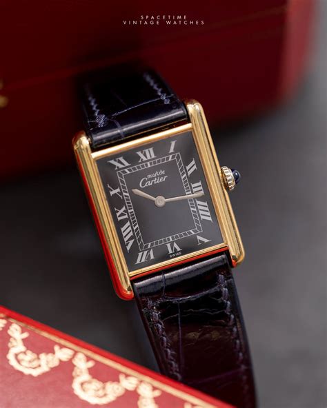 must de cartier tank black dial